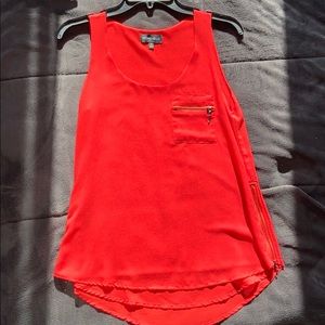 Sleeveless red top